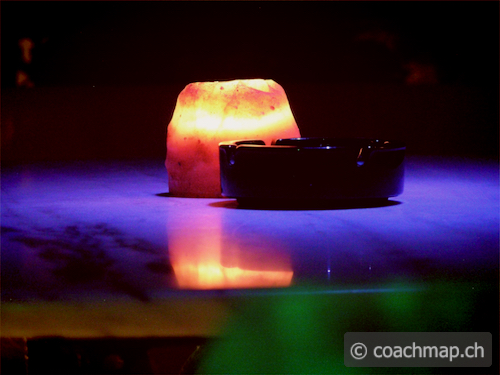 candel on a table at night